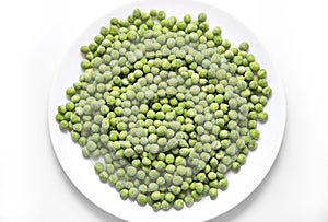 Frozen green peas on a plate