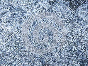 Frozen ground texture background. Background of the soil and snow.