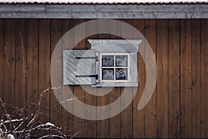 Frozen ice crystals on an old barn window