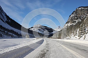 Frozen ice road in front of a mountain