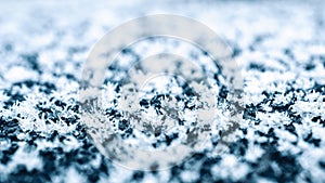 Frozen ice texture. Cold snow winter background. Blue crystal frozen abstract pattern. White frost ice texture.