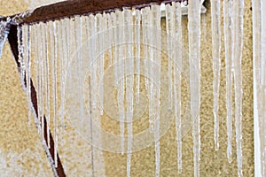 Frozen icy down pipe, icicles