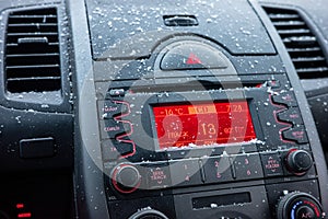 Frozen interior of car in cold winter