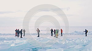 Frozen Lake Baikal, Aerial view. Beautiful winter landscape with clear smooth ice. Famous natural landmark Russia. Blue