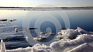 Frozen lake with white snow photo
