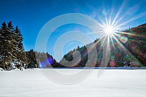 Frozen lake and forest of Mount Sutton in Quebec