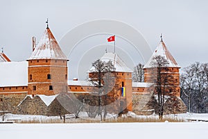 Facade of the historical Trakai stone castle in winter, front view, Lithuania.
