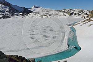 Frozen lake in La vall Fosca area, in the catalonian Pyrenees Mountains, Spain