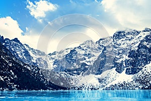 Frozen lake Morskie oko with mountain landscape photo