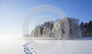 Frozen lake with shoe prints