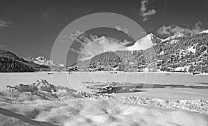 Frozen Lake St. Moritz, wintersport village, Upper Engadin photo