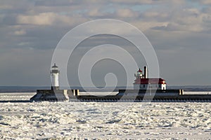 Frozen Lake Superior shoreline with lighthouses and shipping pie