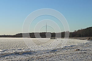 Frozen lake tv tower winter snow forest