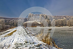 Frozen lake winter landscape in Croatia