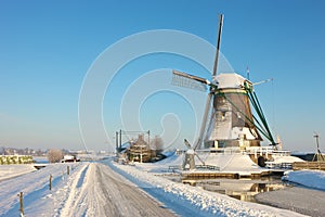 Frozen landcape with windmill