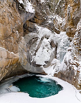 The frozen Lower Johnston Falls in the Johnston Canyon