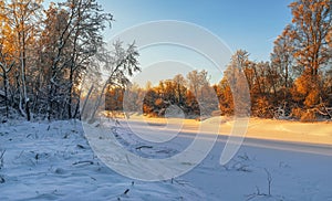 Frozen Luga river at sunset.Novgorod Oblast.Russia photo