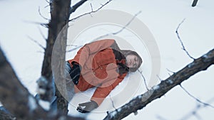 Frozen man on the ground in winter