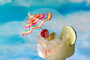 Frozen margarita with umbrella garnish