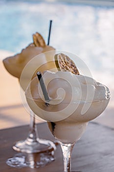 Frozen Margaritas With Straw And Fruit Decoration