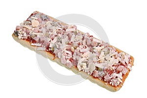 Frozen mass production small square pizza with mushrooms, salami, ham and mozzarella