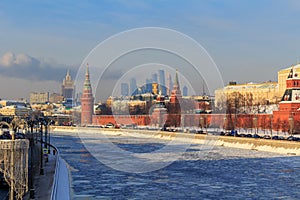 Frozen Moskva river on the background of Moscow Kremlin on a sunny winter morning