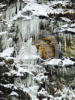 The frozen mountainside near a river in West Virginia - WINTER - USA photo