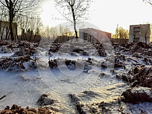 frozen mud at the beginning of winter in the daytime