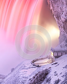 Frozen Niagara Falls with snow and ice covering a viewing platform during a polar vortex