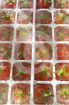 Frozen Pachino tomatoes in small cubes for a refreshing aperitif