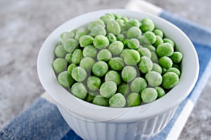 Frozen Peas in White Bowl