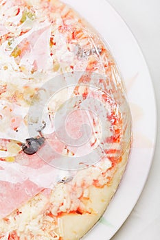 Frozen pizza on plate