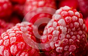 Frozen raspberry texture close up for background