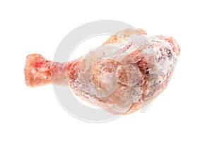 Frozen raw chicken leg meat isolated on white.