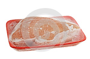 Frozen raw turkey breast on foam meat tray