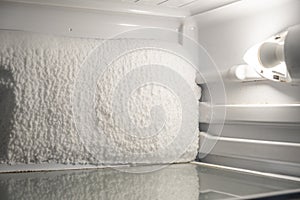 Frozen refrigerator that needs to be defrosted.