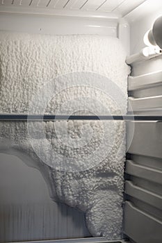 Frozen refrigerator that needs to be defrosted.