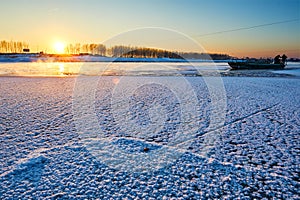 The frozen river sunset