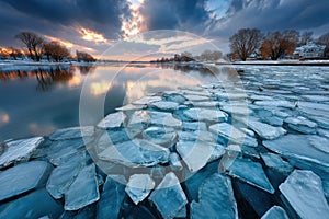 Frozen River at Sunset with Broken Ice Sheets