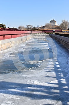 Frozen river at Tian`anmen Square near the Forbidden City in Beijing, China