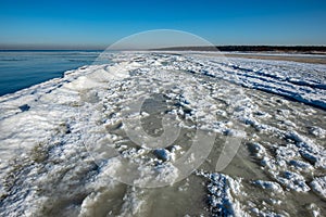 frozen sand textures in winter by the sea beach