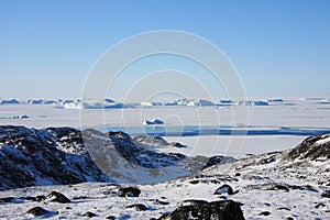 Frozen Sea and Arctic Tundra, Greenland photo