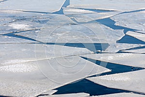 Frozen sea with pattern of ice floes