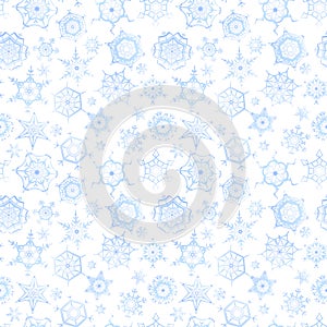 Frozen snowflakes on white background, winter seamless pattern