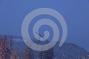 Snowy scenery of forests and hills in winter in High Tatras Slovakia