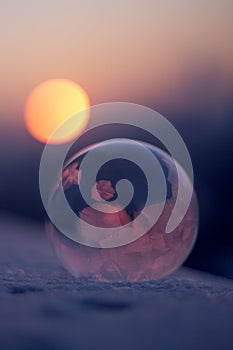 Frozen soap bubble in sunshine