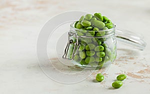 Frozen Soy beans in a glass jar. Freezing is a safe method of increasing the shelf life of nutritious foods