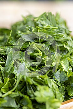 frozen for storing green spice parsley on the table photo