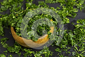 frozen for storing green spice parsley on the table photo