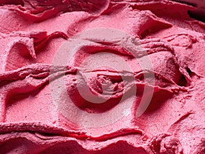 Frozen Strawberry flavour gelato - full frame detail. Close up of a pink surface texture of Ice cream